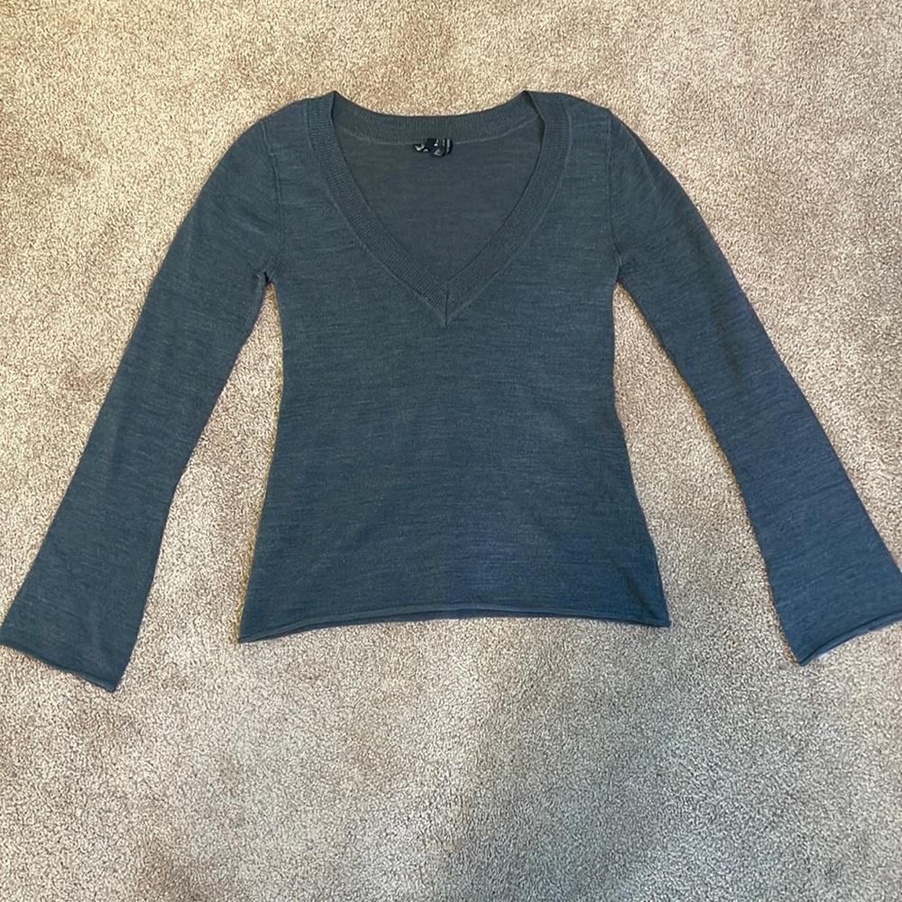 Take out grey sweater
